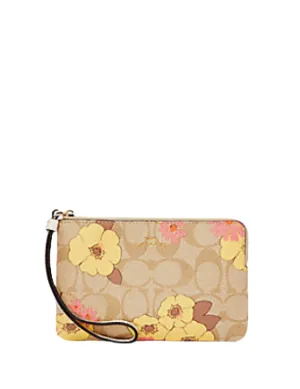 Coach Corner Zip Wristlet In Signature Canvas With Floral Cluster Print