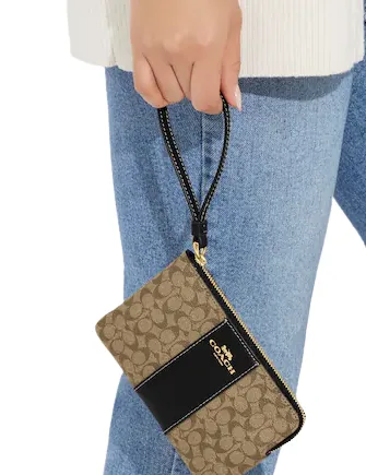Coach Corner Zip Wristlet In Signature Canvas