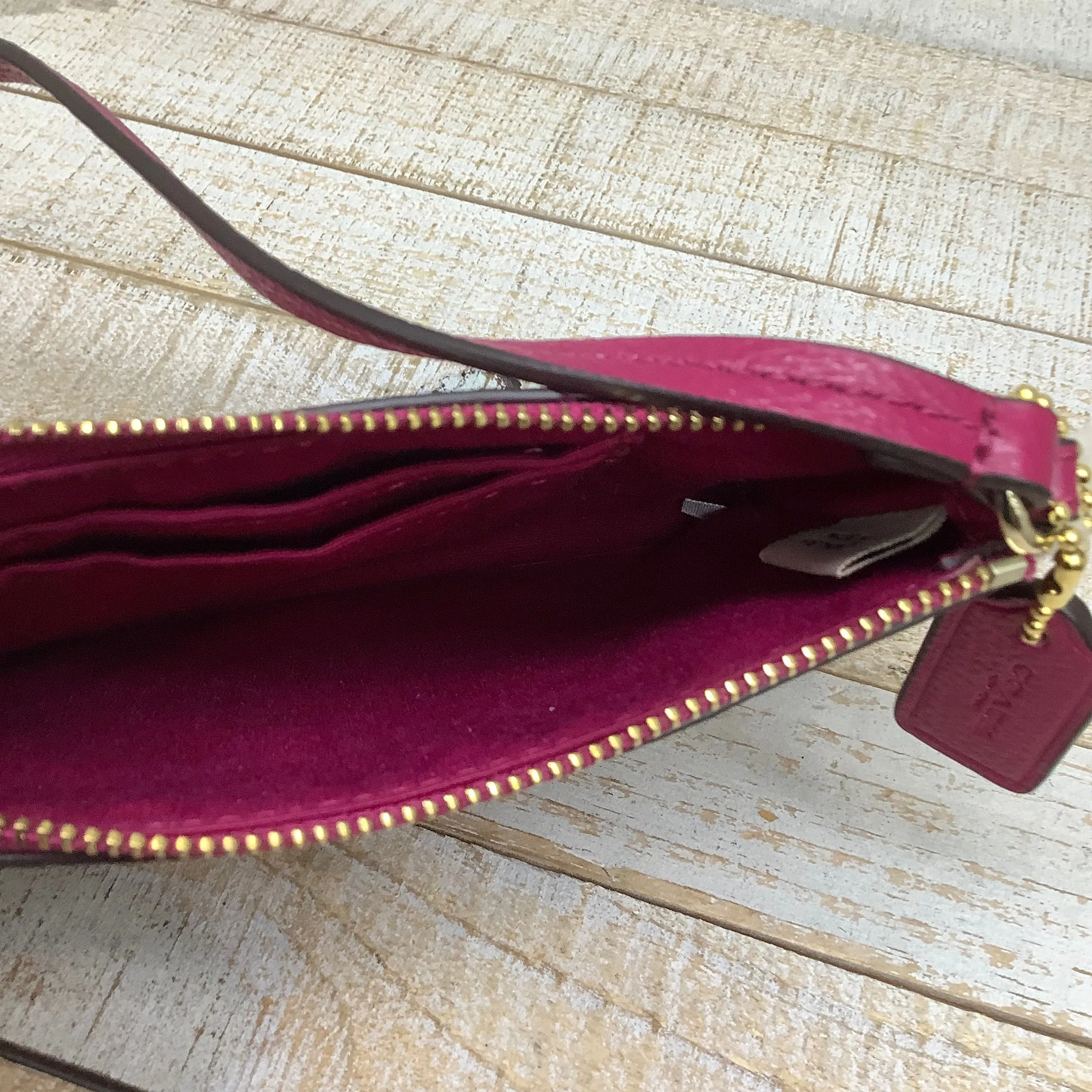 Wristlet Designer by Coach, Size Medium