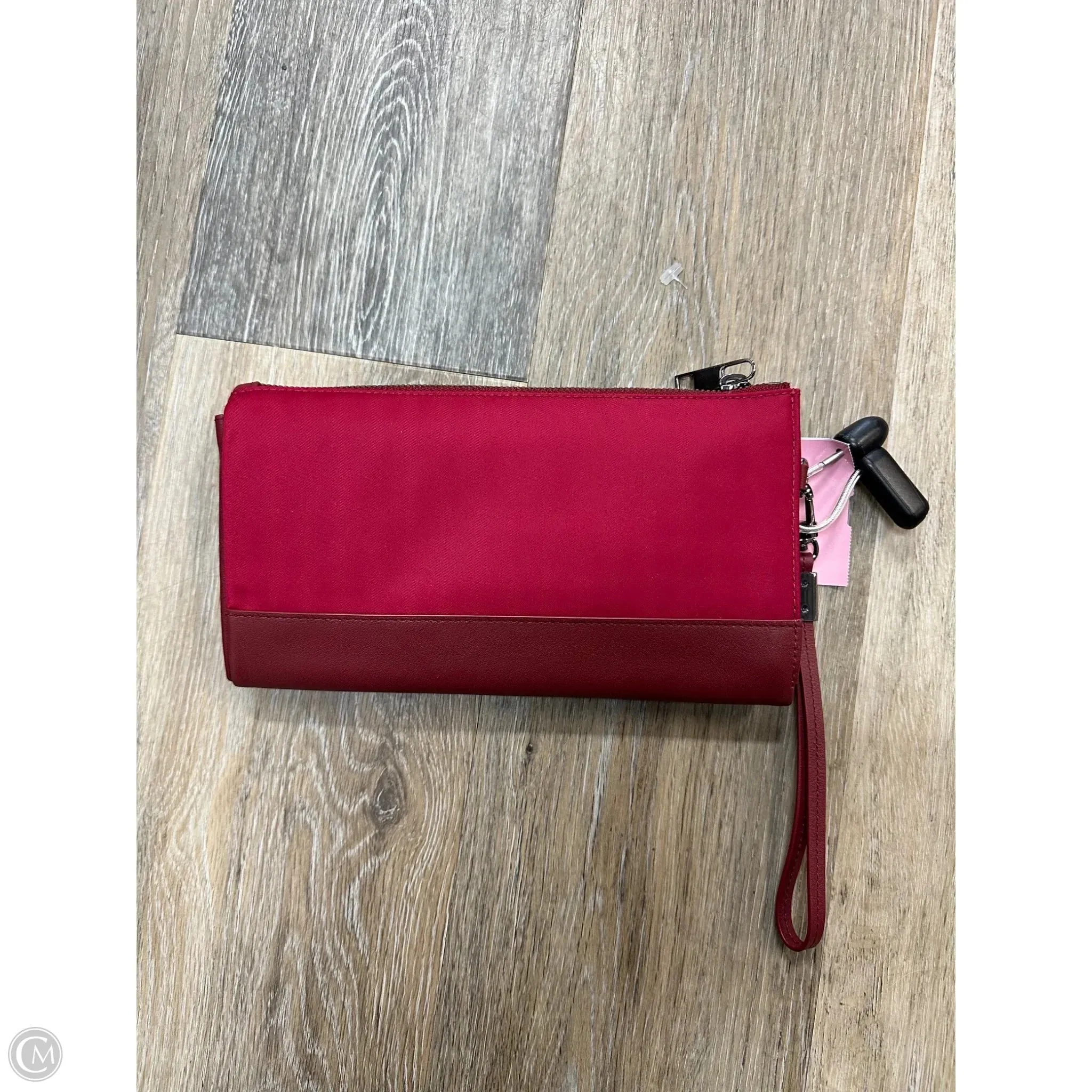 Wristlet Designer By Tumi, Size: Large