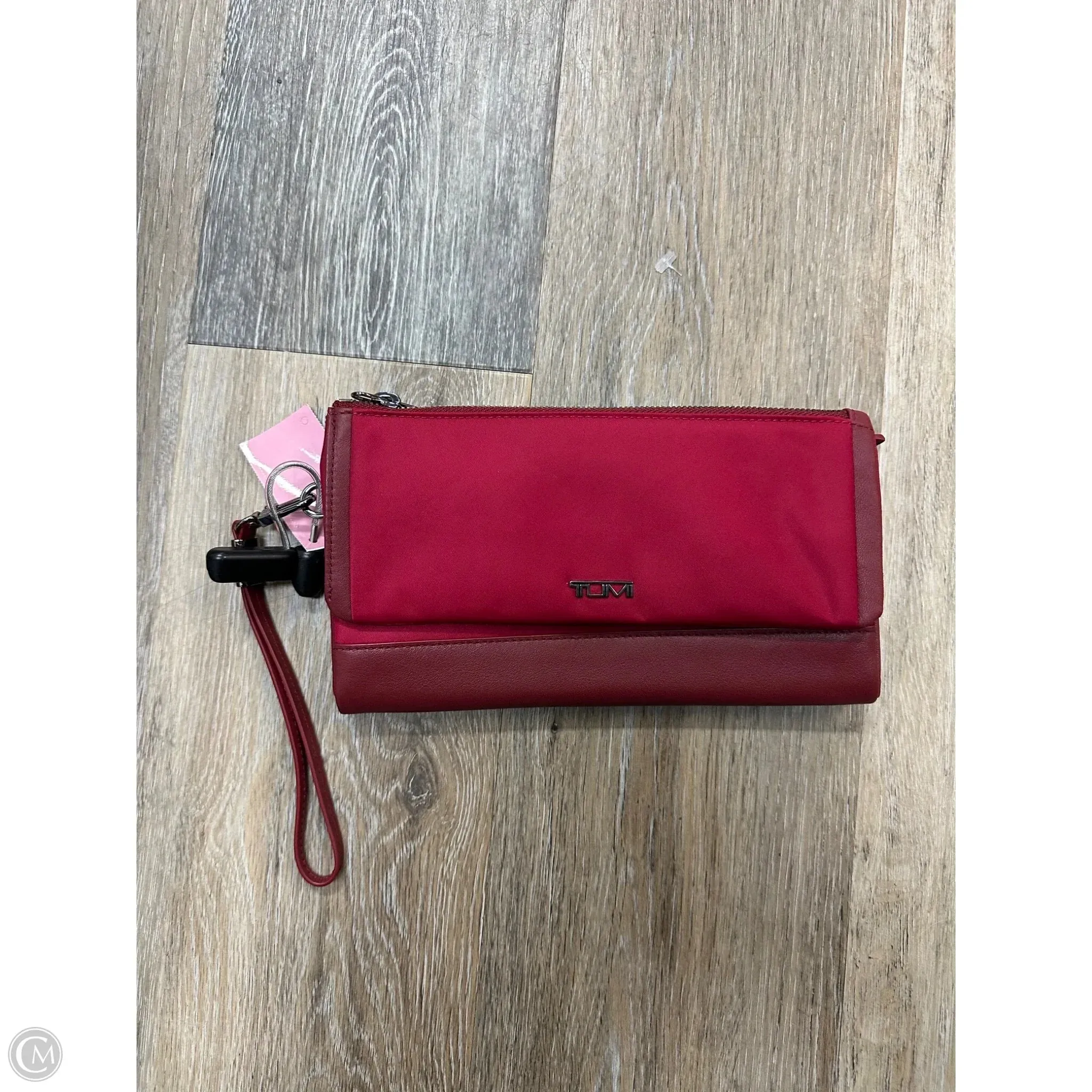 Wristlet Designer By Tumi, Size: Large