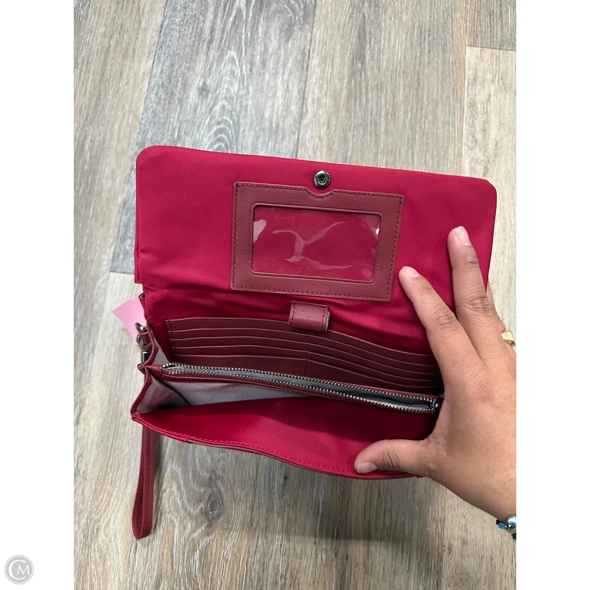Wristlet Designer By Tumi, Size: Large